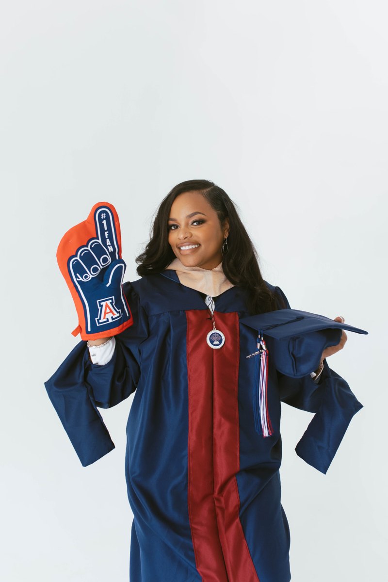 Amethyst Lowe in cap and gown at her University of Arizona MBA graduation